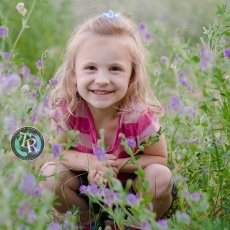 little girl with flowers